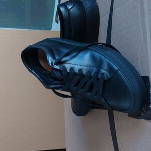 Men leather sneakers by Good man brand in solid black.